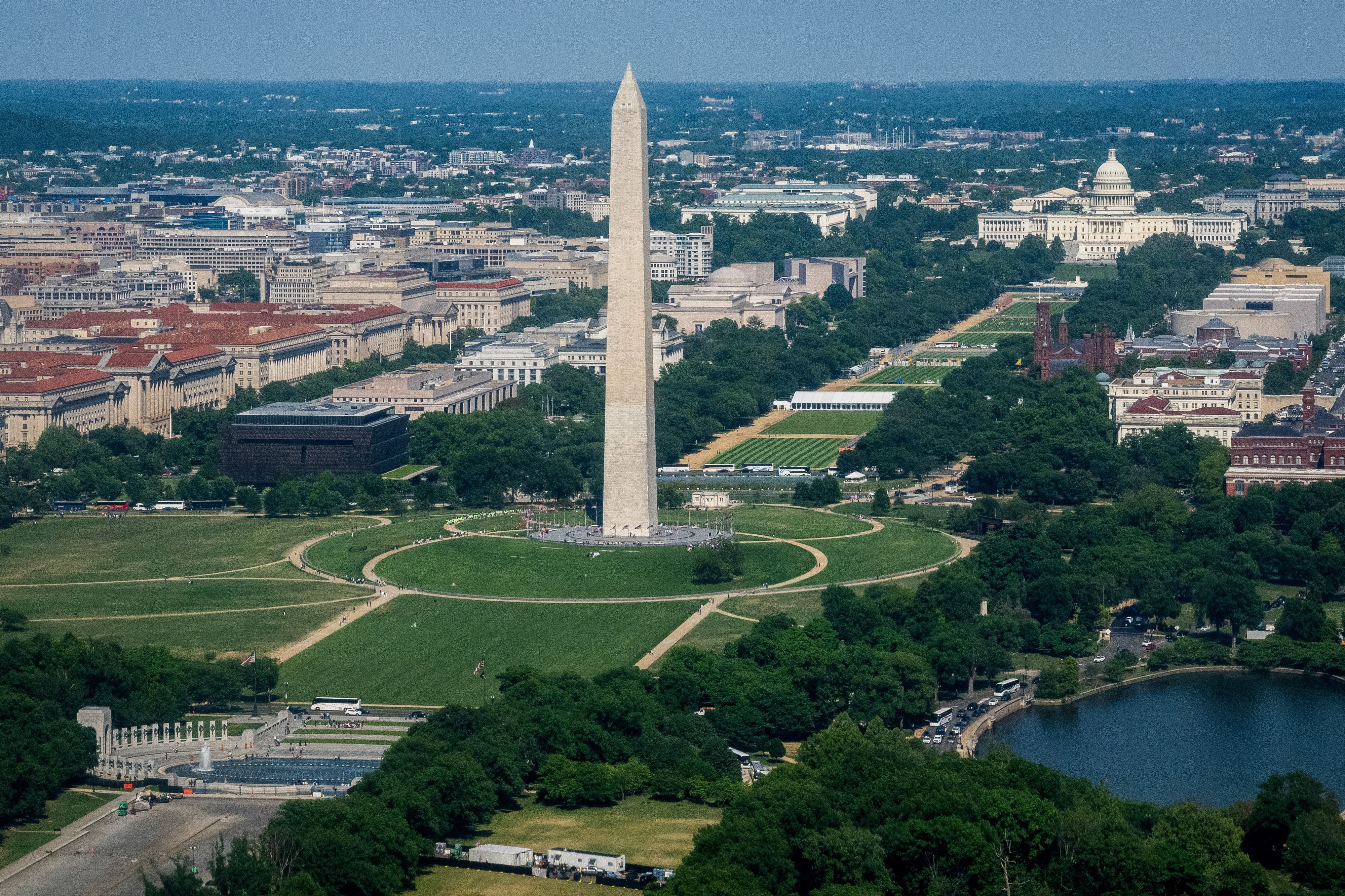 Aerial presumption of the Washington Monument connected the National Mall, with the U.S. Capitol and surrounding cityscape disposable successful the background