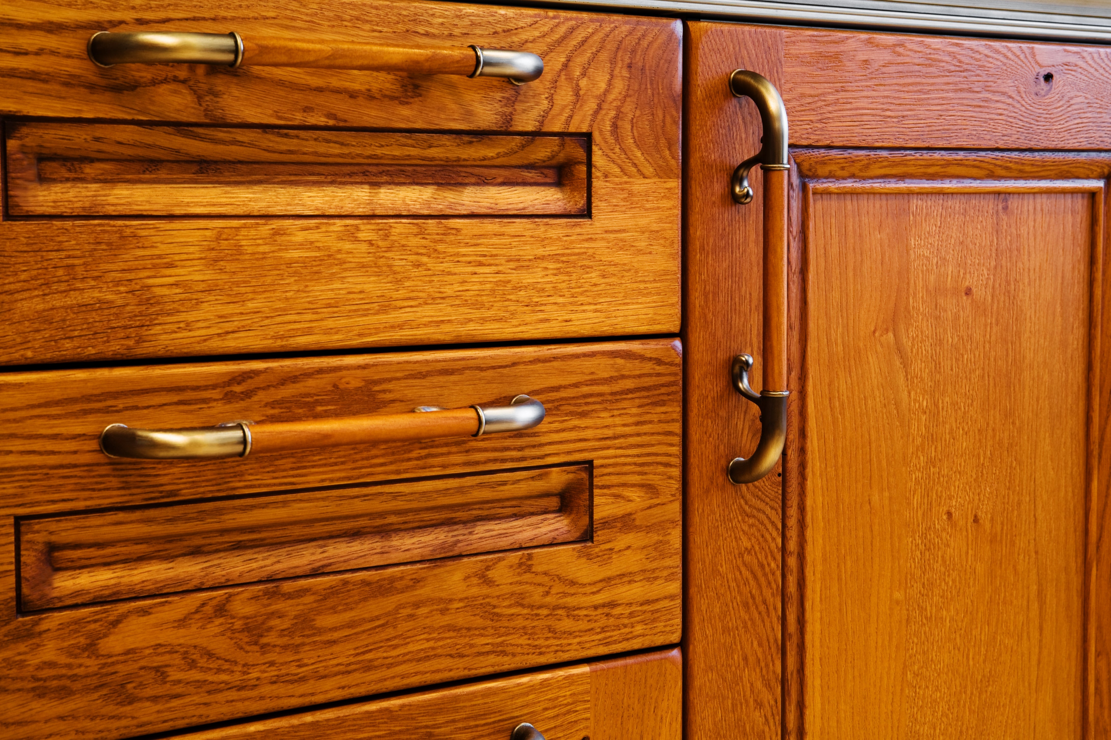 Wooden room cabinets with brass handles, featuring a sleek and modern design. Perfect for location betterment oregon decor inspiration