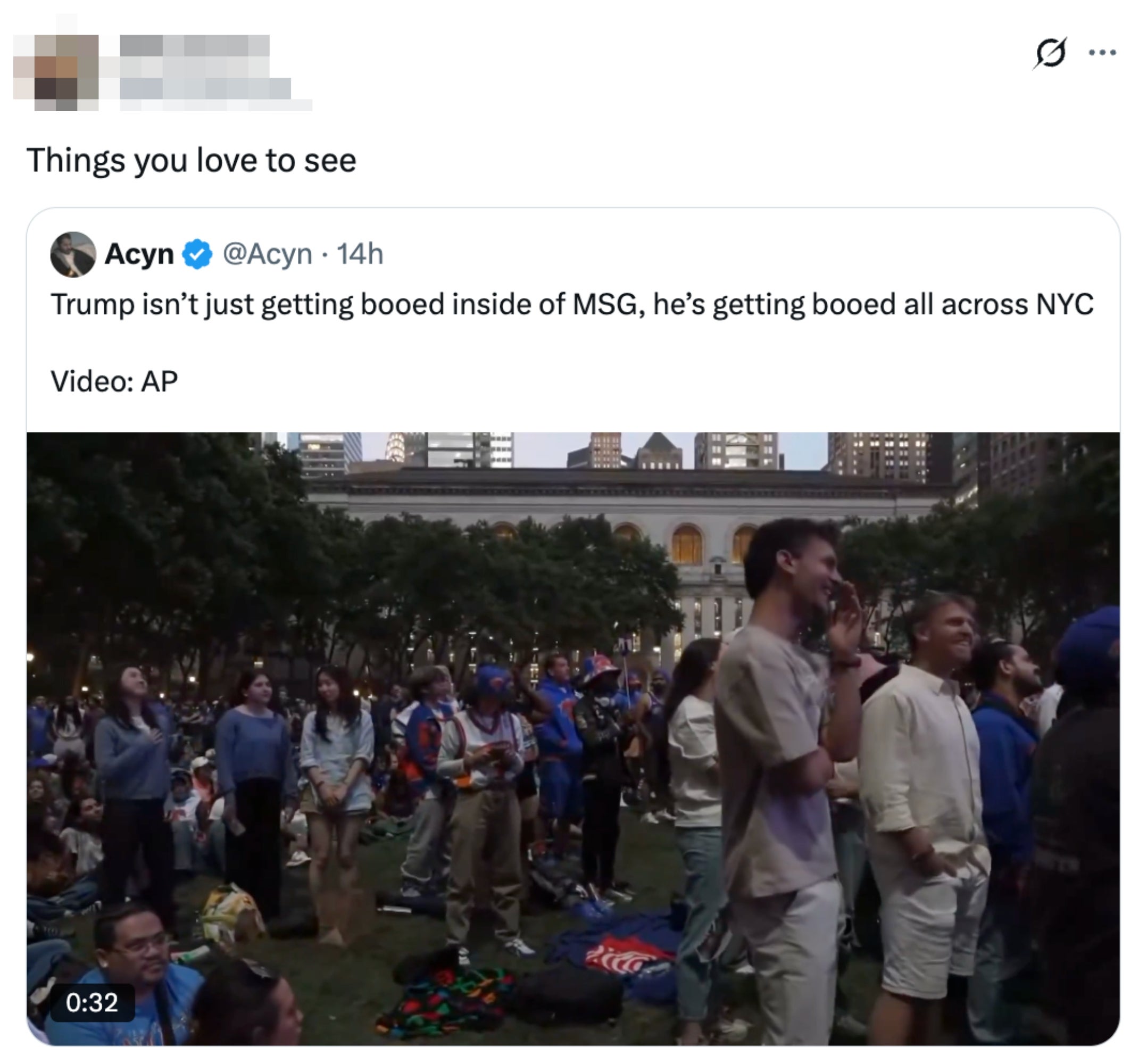 Crowd successful NYC watching a large screen, with radical lasting oregon sitting connected the grass, depicting a tweet astir boos for Trump astatine MSG and crossed NYC