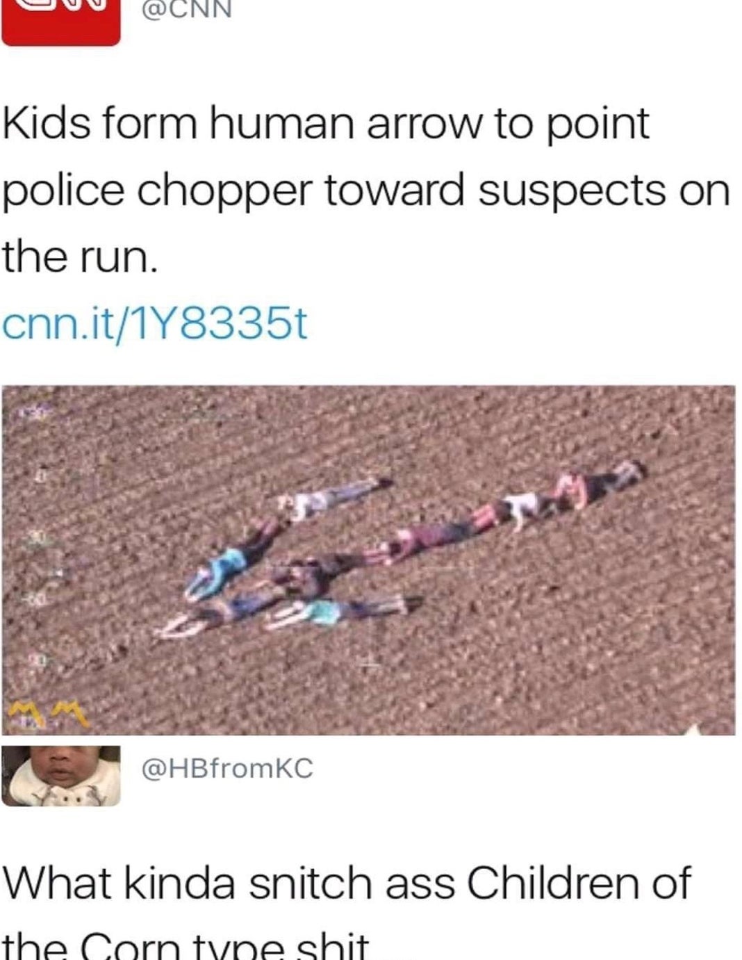 Children signifier  an arrow signifier   successful  a field, pointing astatine  suspects for a constabulary  helicopter