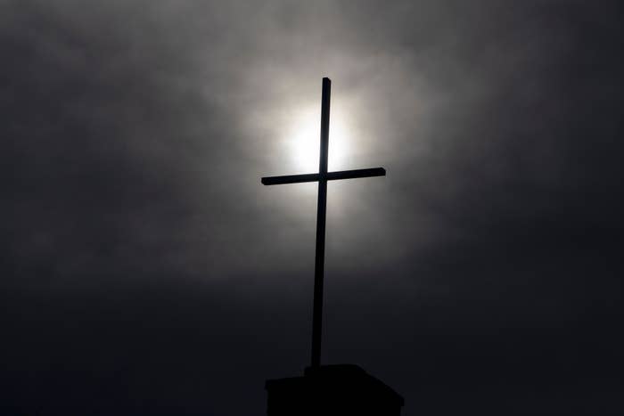Silhouette of a transverse  against a bright, cloudy sky, suggesting a spiritual   oregon  spiritual  theme