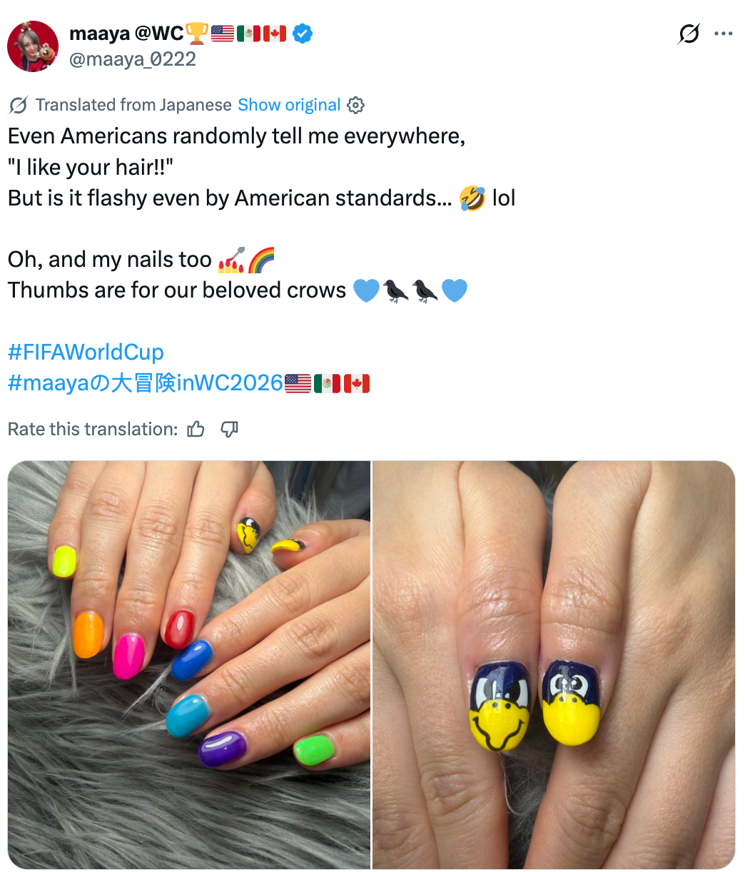 Two hands with colorful nails; each   nail has chiseled  designs, including smiley faces and birds