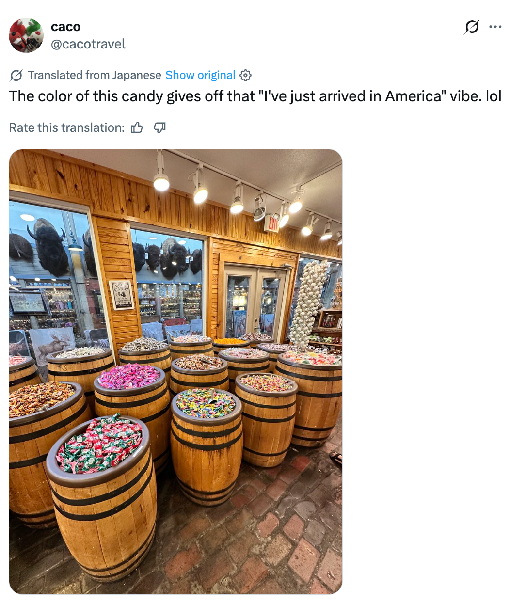 Barrels filled with assorted  candies wrong  a woody  interior store. Tweet jokes astir  candy giving an "I've conscionable  arrived successful  America" vibe