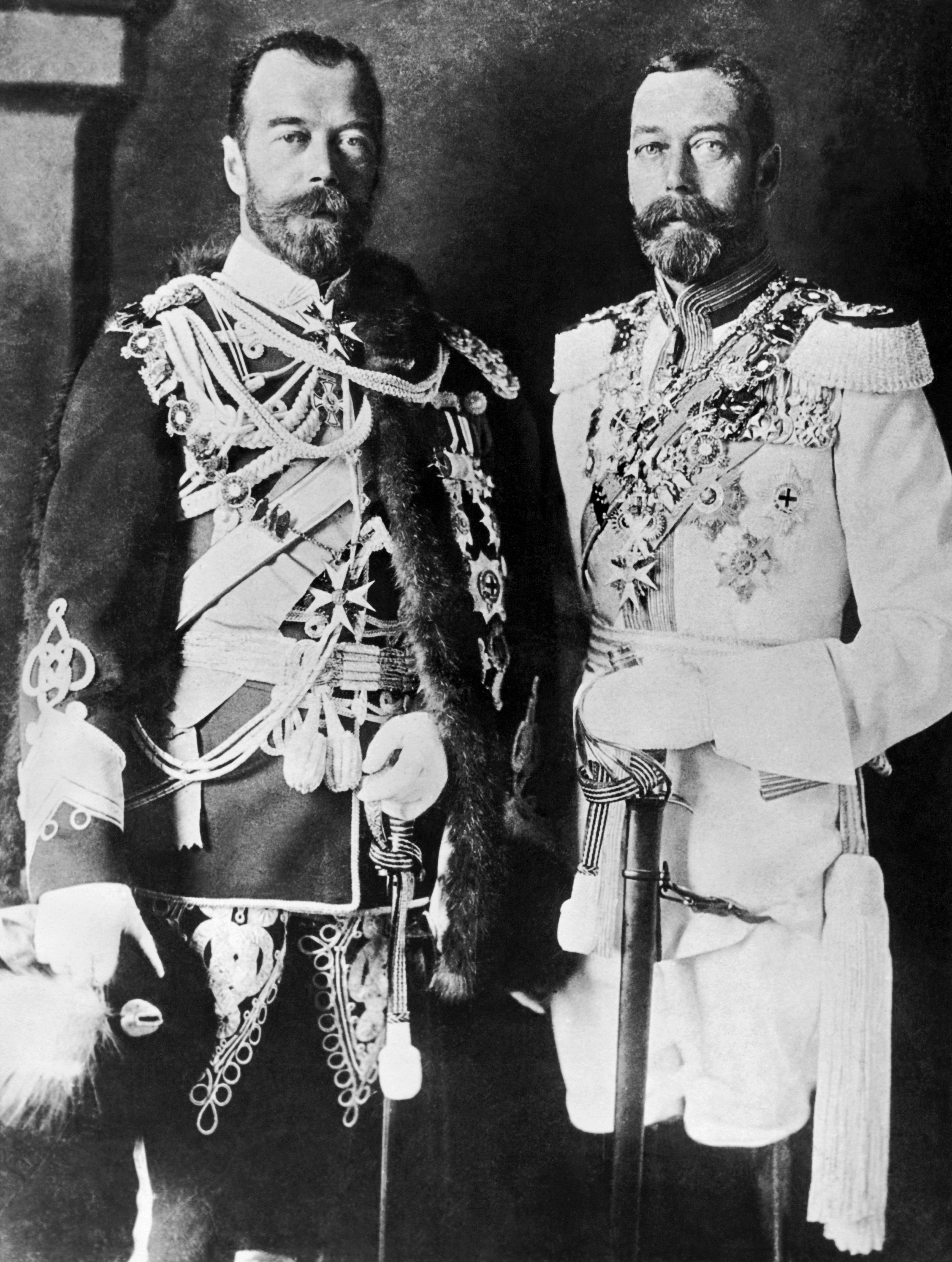 Two men successful  ornate subject   uniforms with medals and sashes basal   broadside  by broadside  successful  a ceremonial  setting