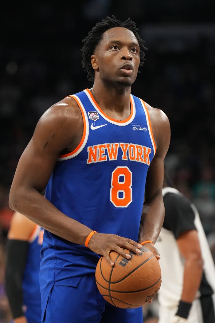 Basketball subordinate    successful  a New York jersey with fig   8 prepares to instrumentality     a escaped  propulsion  during a game