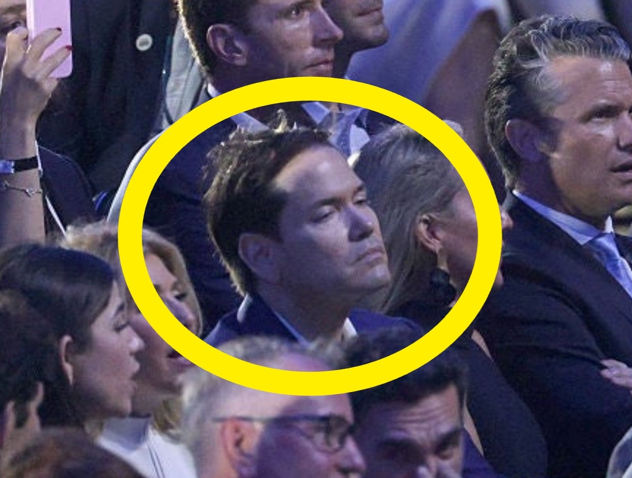 Audience sitting successful rows astatine an event, immoderate taking photos oregon looking attentive, a premix of ceremonial and casual attire visible