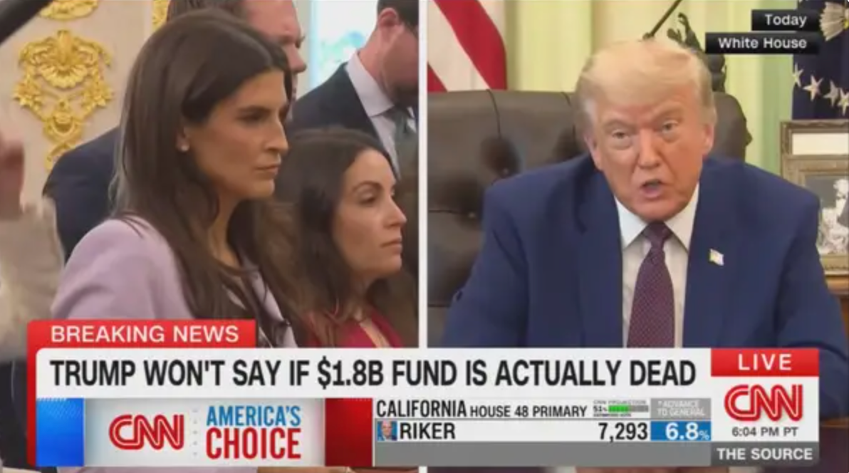 Politicians successful a meeting; a pistillate successful ceremonial attire stands beside a antheral speaking, captured during a CNN quality broadcast