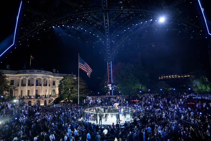 Thousands stitchery  astatine  a nighttime lawsuit   adjacent   the White House with an illuminated signifier    and American emblem  successful  view