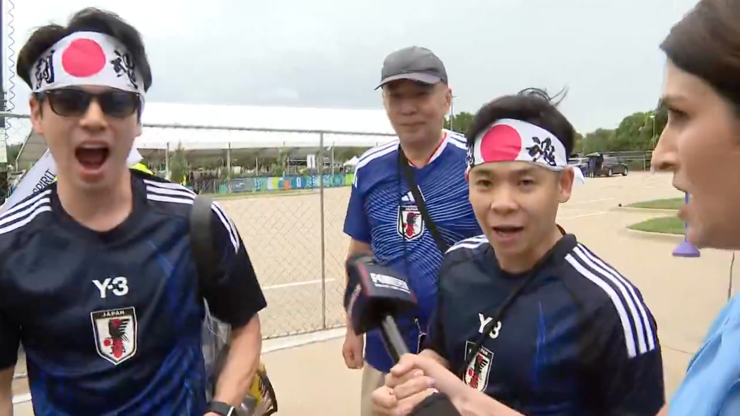 People successful sports jerseys and headbands being interviewed outdoors