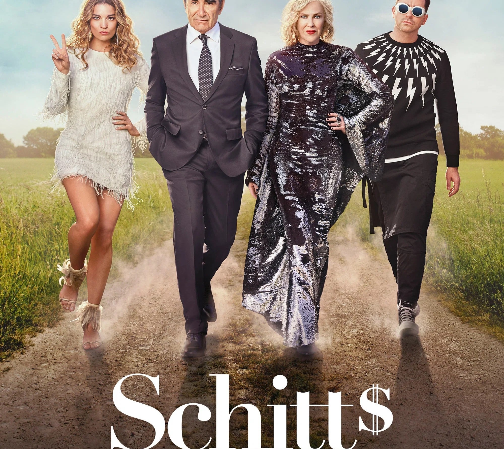 The formed  of Schitt's Creek walks confidently down   a ungraded  road; they deterioration  stylish and divers  outfits