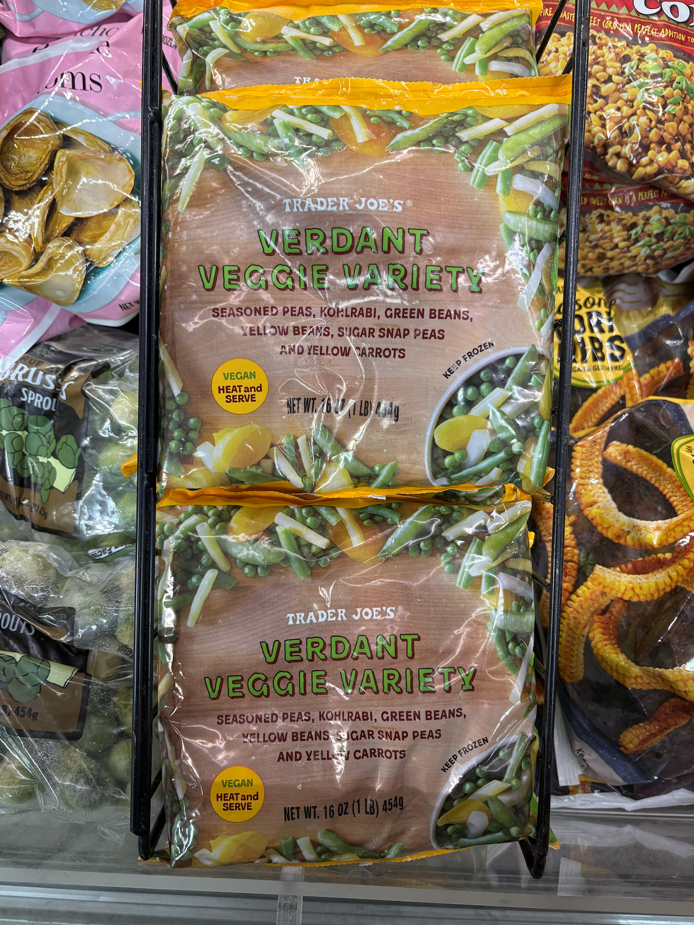 Trader Joe's Verdant Veggie Variety packs in freezer; contains peas, kohlrabi, green beans, yellow beans, snap peas, and yellow carrots