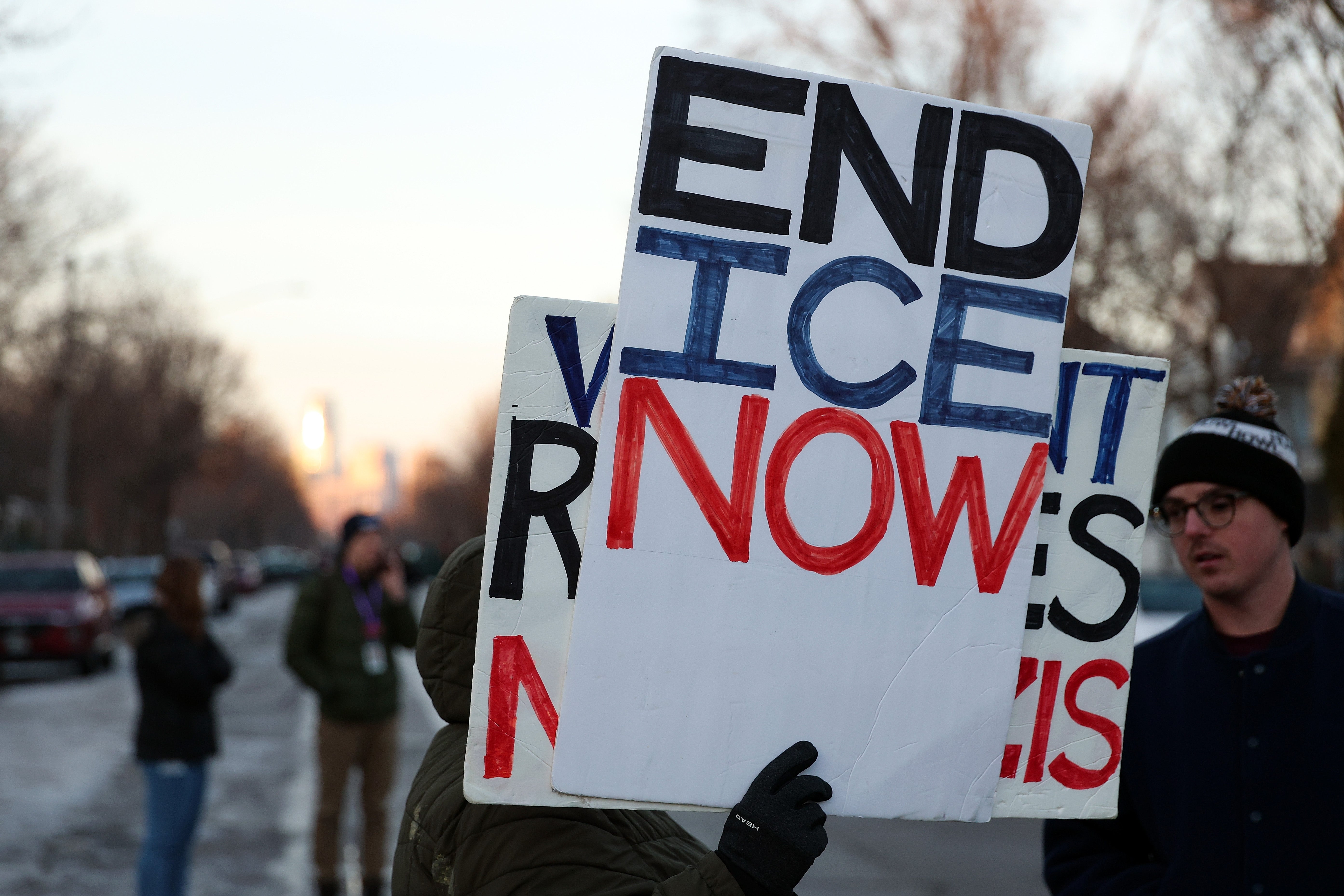 Protesters clasp signs speechmaking "End It Now" successful a thoroughfare demonstration