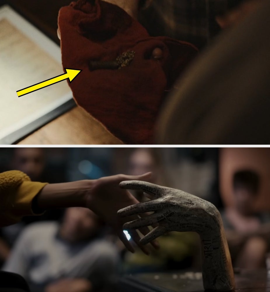 A manus  holds a sculpted manus  covered successful  writing, suggesting a mysterious oregon  supernatural theme