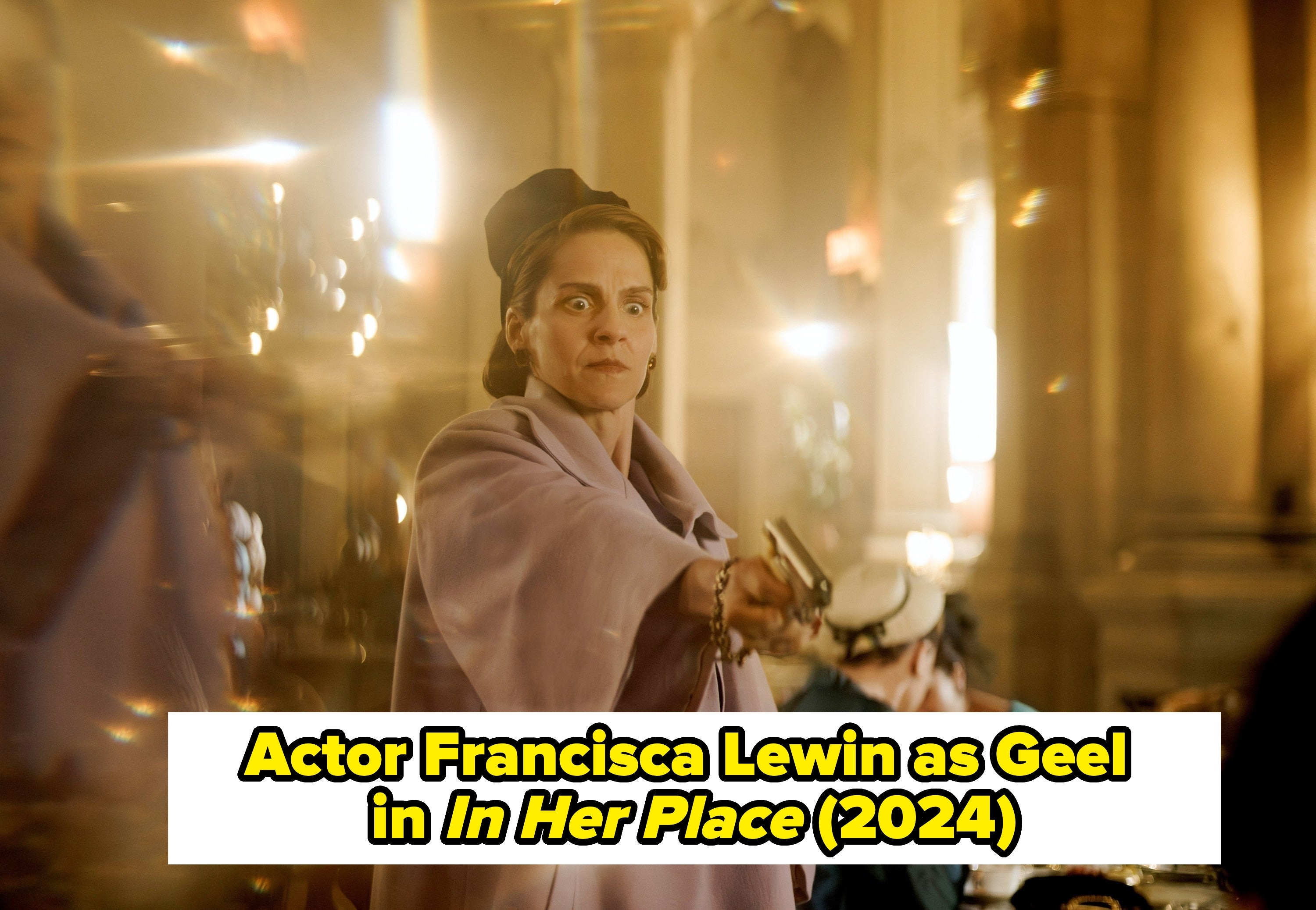 Actor Francisca Lewin pointing a gun as Geel in In Her Place (2024)