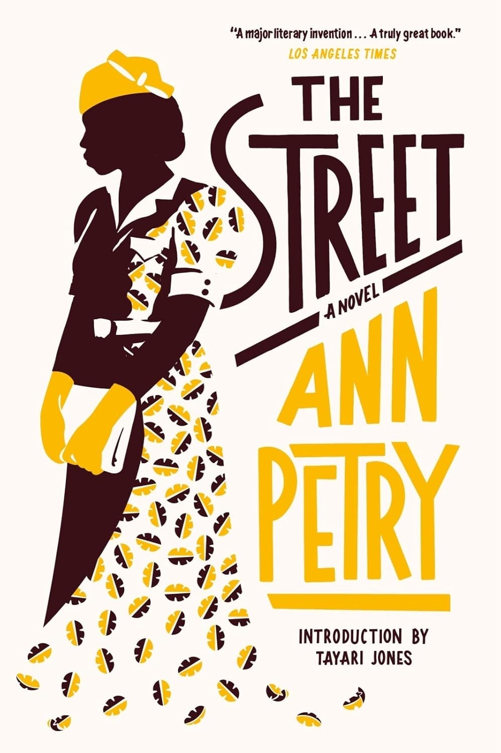 Book screen  of "The Street" by Ann Petry, featuring a silhouette of a pistillate   successful  a patterned formal  and hat; includes praise from the Los Angeles Times