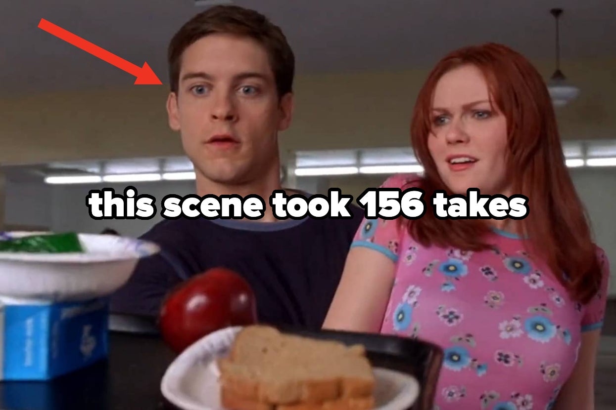 A red arrow pointing at Tobey Maguire and Kirsten Dunst in a scene from "Spider-Man," text overlay: this scene took 156 takes