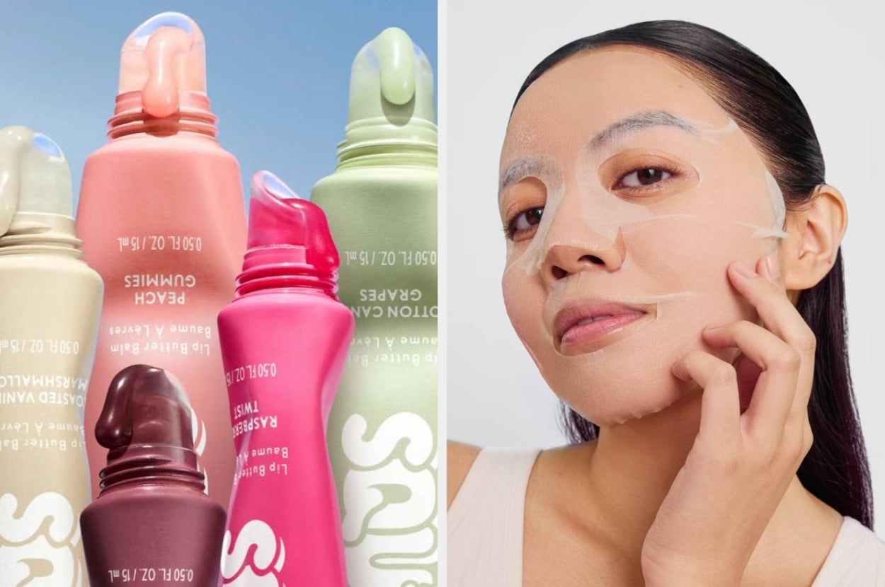Various lip gloss tubes stand upright next to a person applying a facial sheet mask, showcasing skincare and beauty products