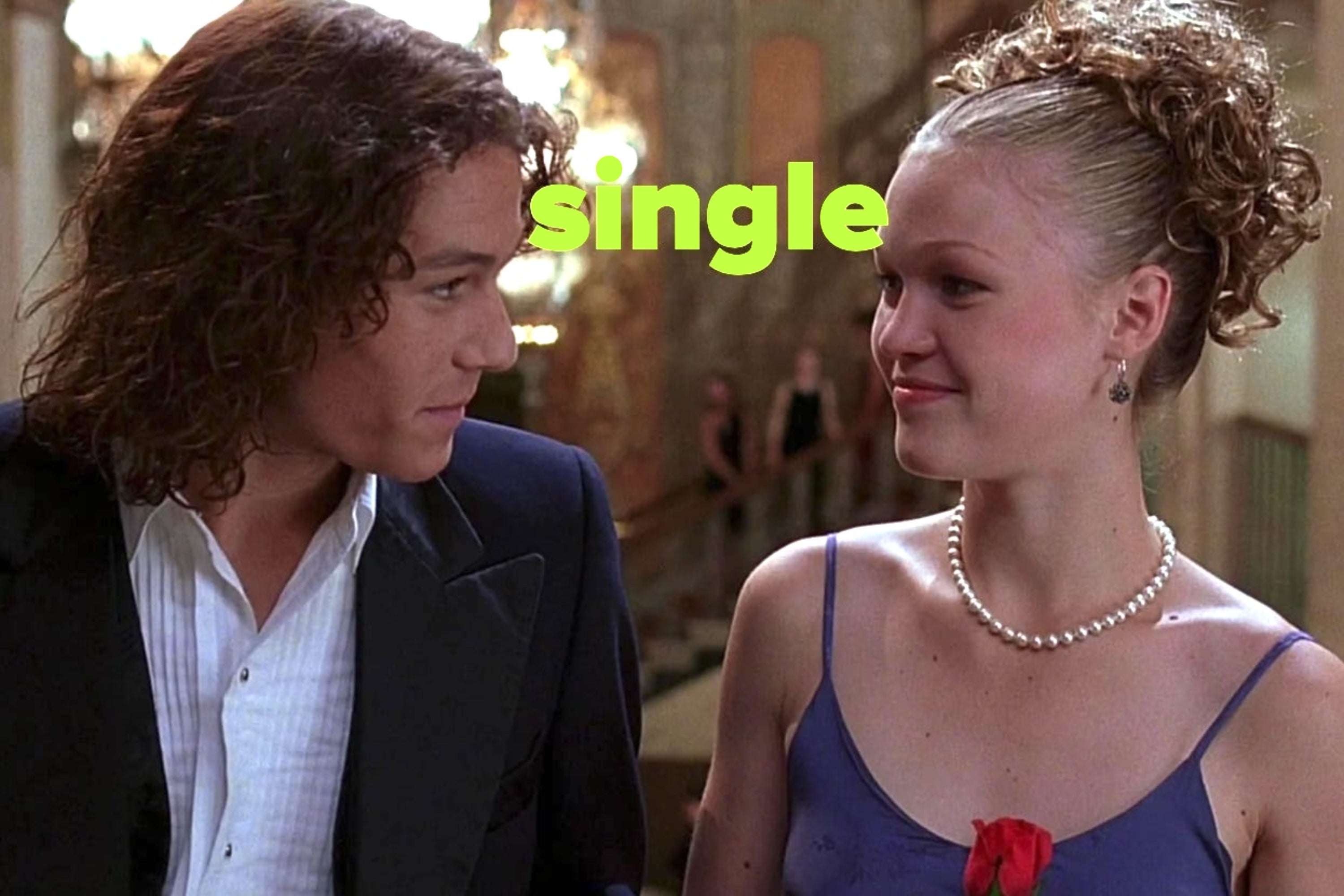 A couple in formal attire exchange a smile. The word "single" is displayed above them