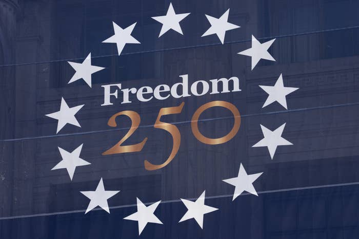 The representation  shows the substance   "Freedom 250" surrounded by a ellipse  of stars