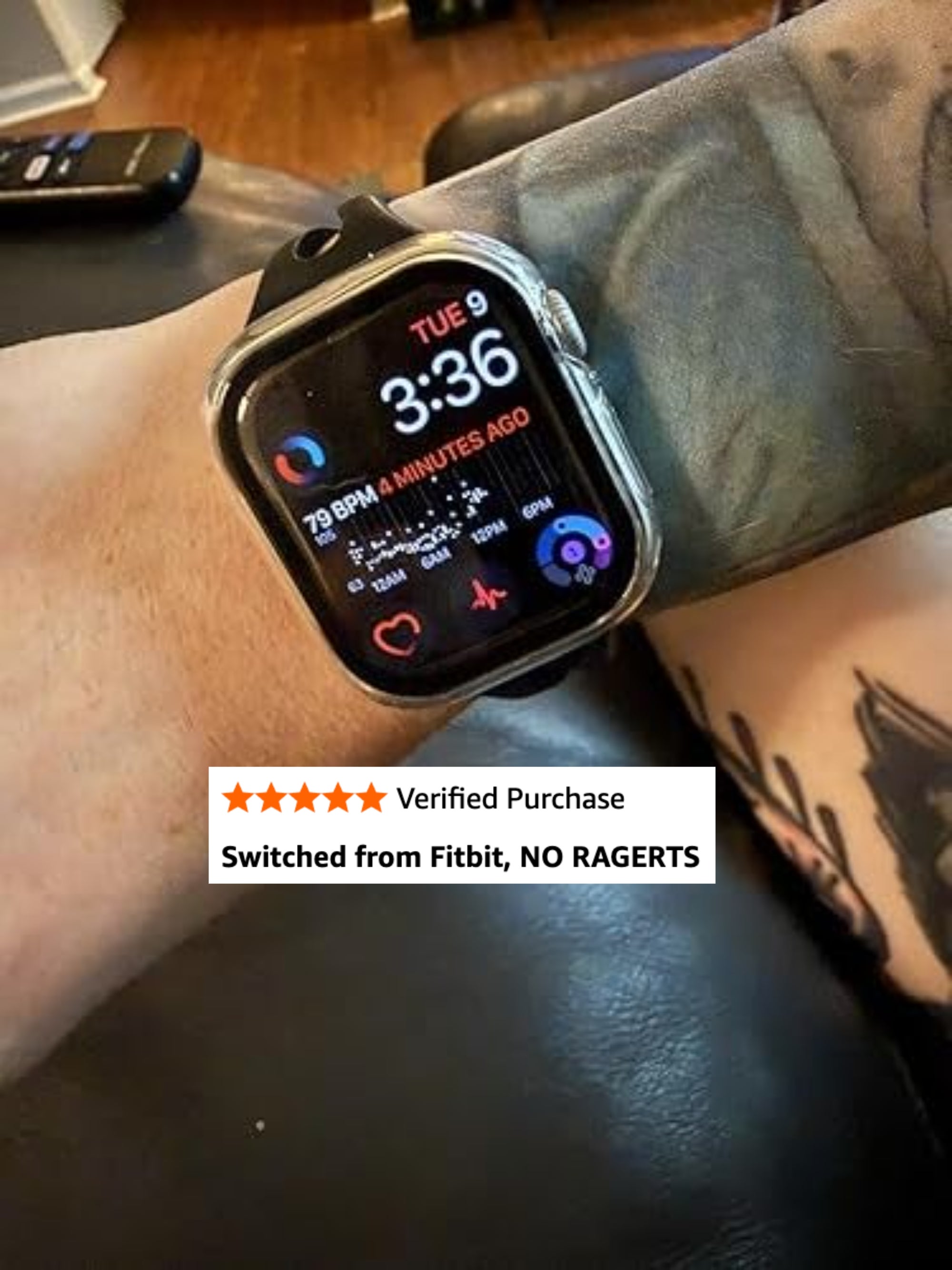 Person wearing a smartwatch displaying time, bosom  rate, and fittingness  data. The ticker  has a achromatic  band, shown connected  a tattooed arm