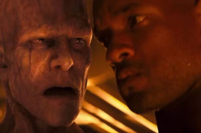 A tense country   betwixt  2  characters from a sci-fi movie, 1  appears human, the different   has a distorted, otherworldly appearance