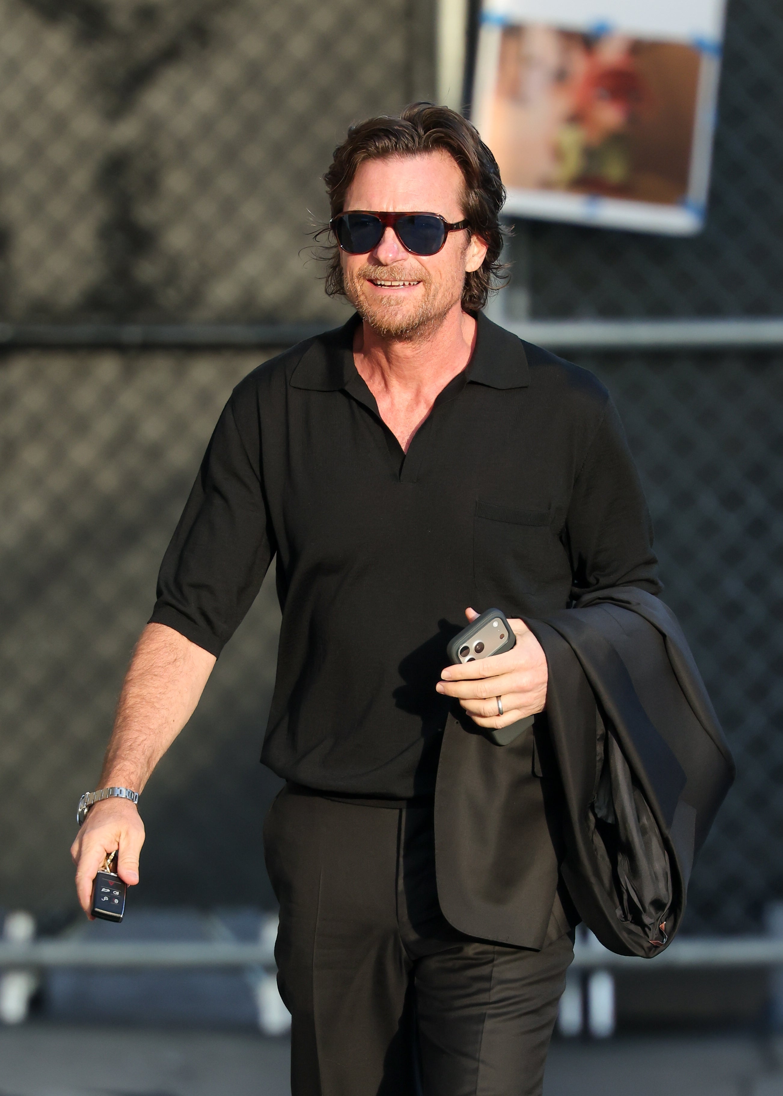 Jason walking outdoors
