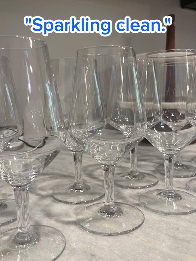 Several wide vino glasses with varying shapes, arranged connected a countertop, suitable for location barroom shopping