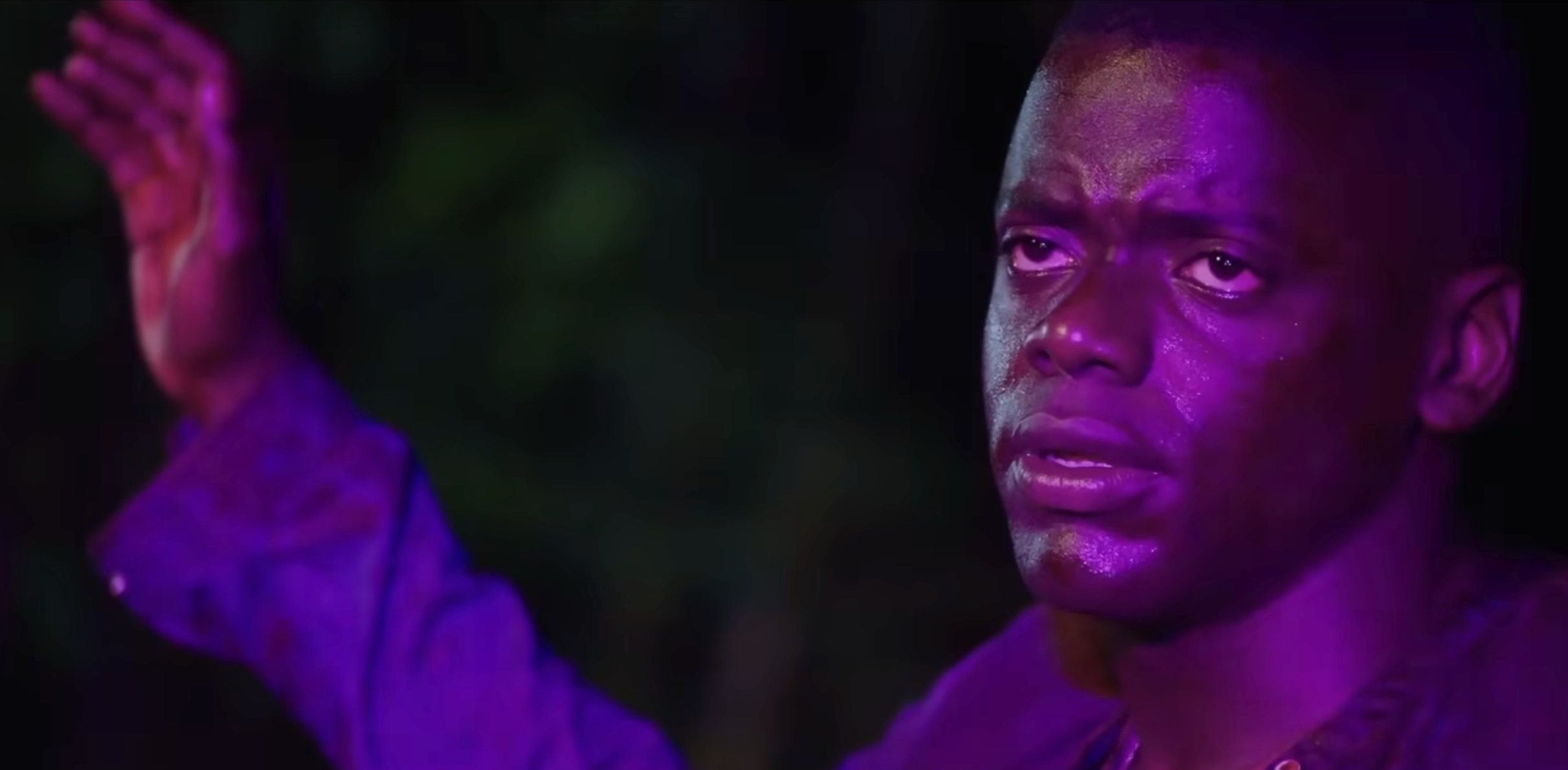 Daniel Kaluuya lifting his arms up   successful  decision   arsenic  constabulary  lights radiance  connected  his face