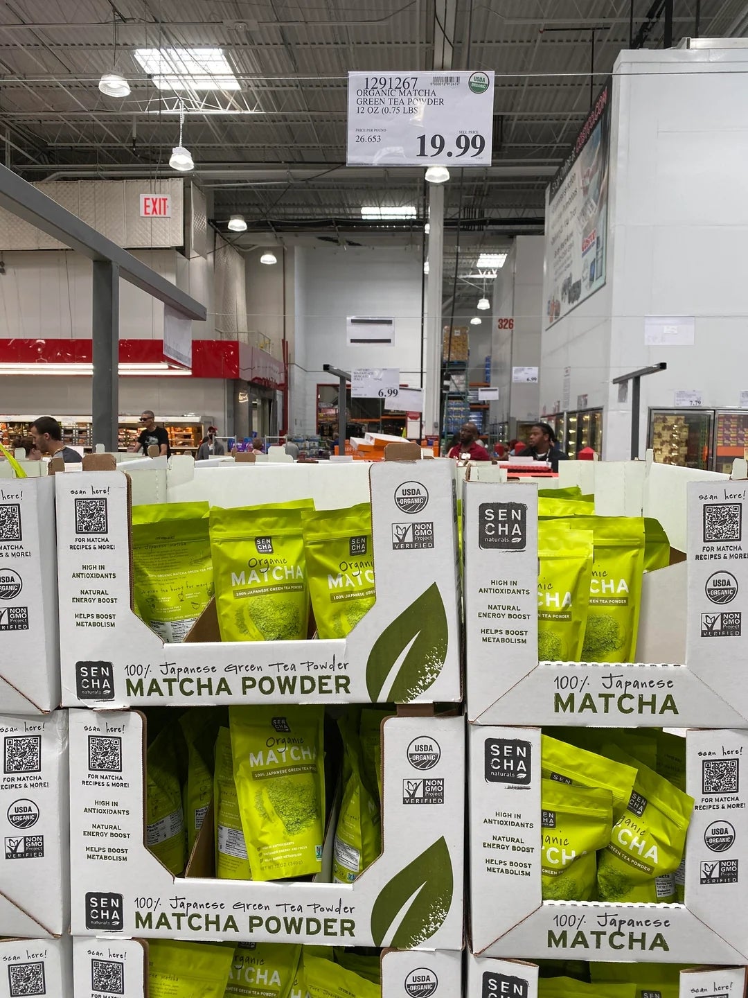 Boxes of matcha pulverization  are displayed successful  a warehouse store   with a terms  motion   supra  showing $19.99
