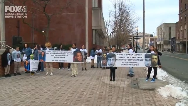 People holding signs astatine  a protestation  seeking justness  for Bianca Lebron, questioning wherefore  the fishy  has not been charged