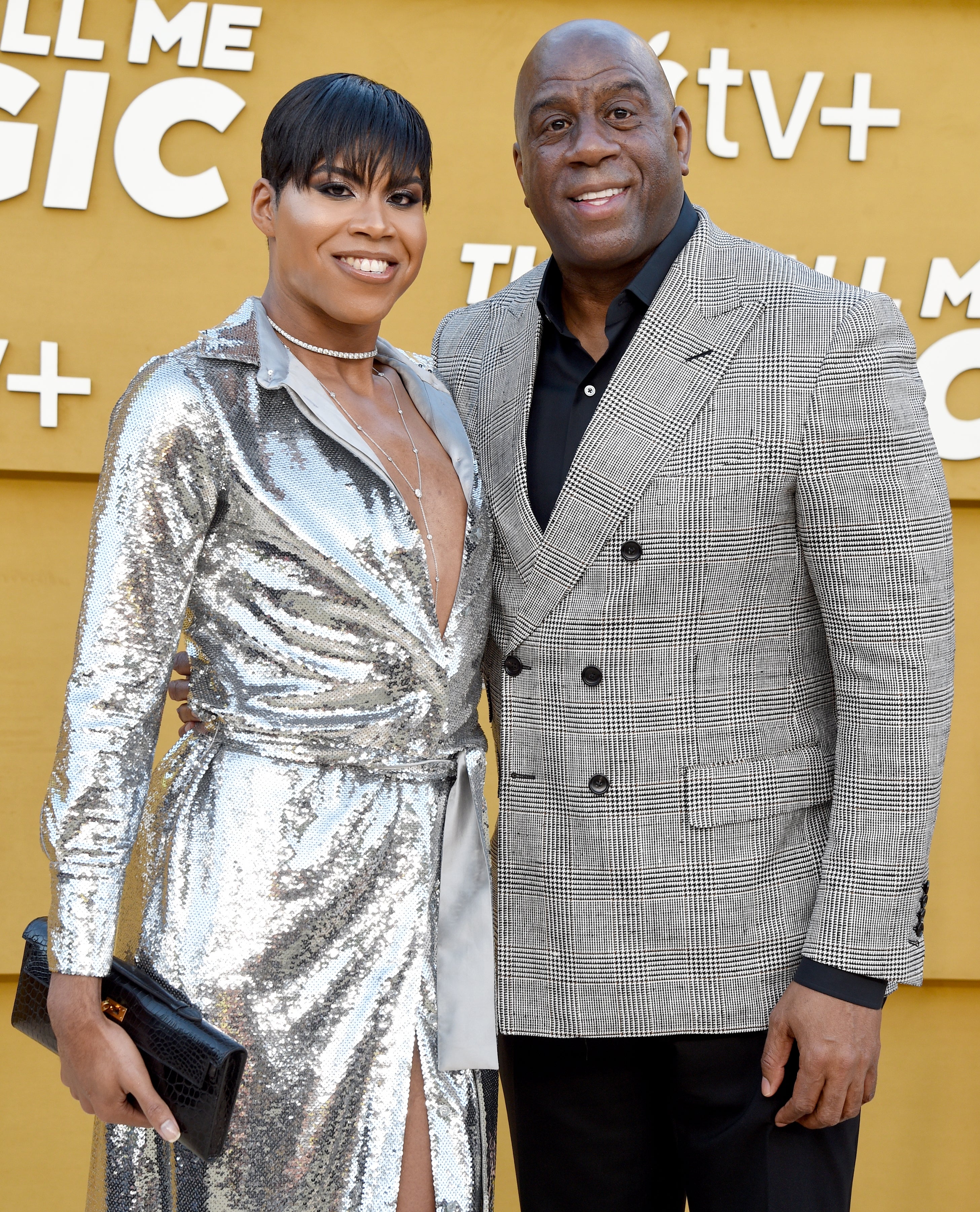 EJ Johnson and Magic Johnson at an event