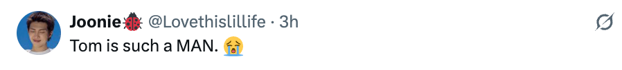 Tweet by user praising Tom with a crying emoji