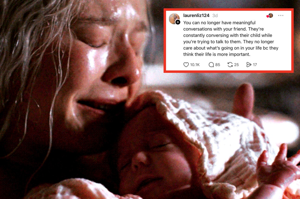 Person holding a newborn baby, appearing emotional and tearful. The scene conveys a sense of tenderness and vulnerability