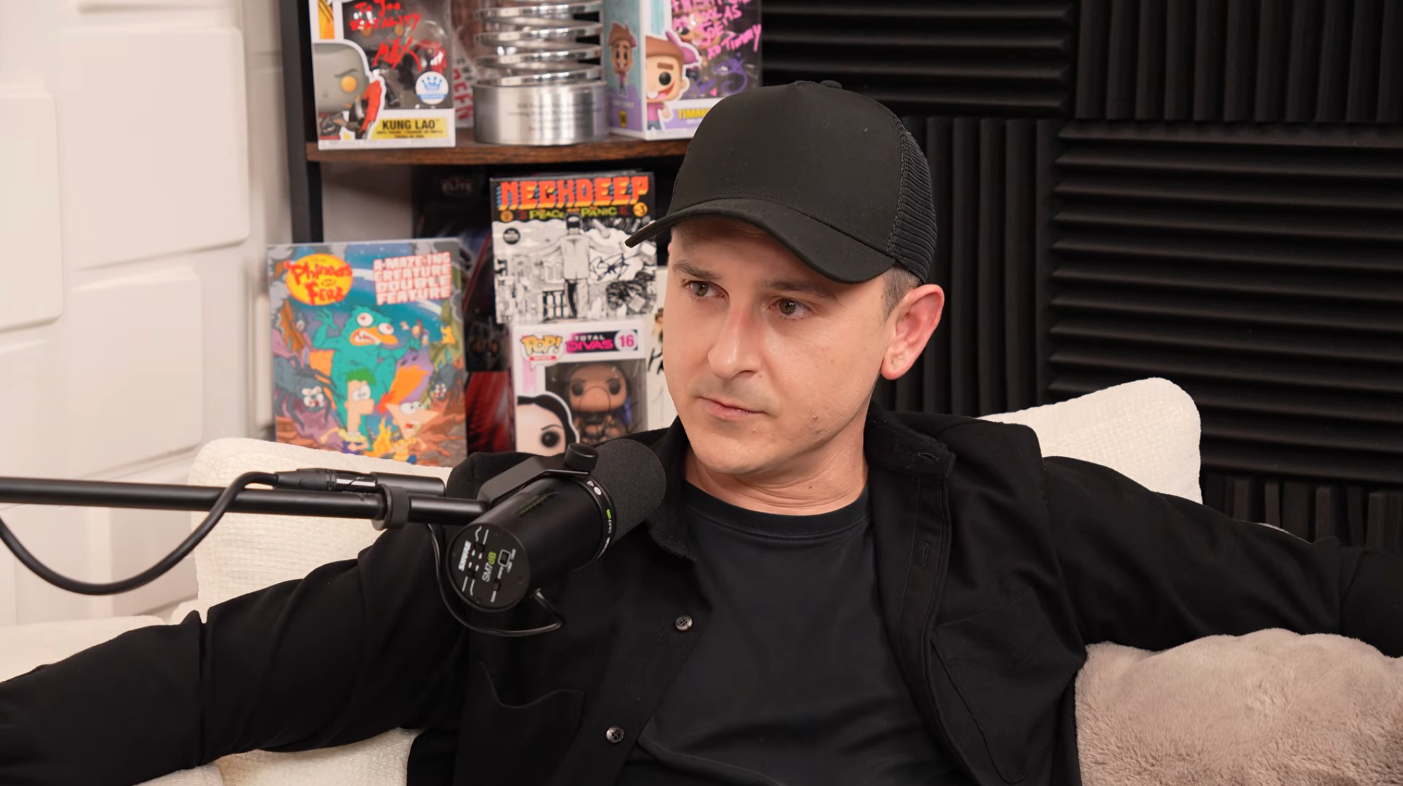 Mitchel speaking on a podcast