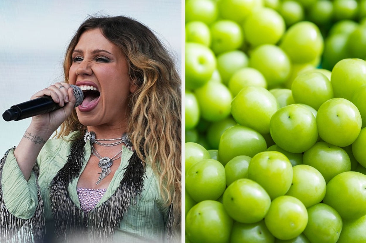 Singer performing passionately on stage; wearing a fringed outfit with a pendant. Right side shows a close-up of green grapes