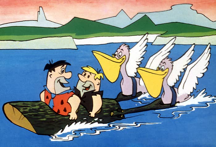Cartoon country   with 2  men sitting connected  a log boat, pulled by 2  ample  birds with yellowish  beaks, acceptable   connected  a bluish  h2o  background