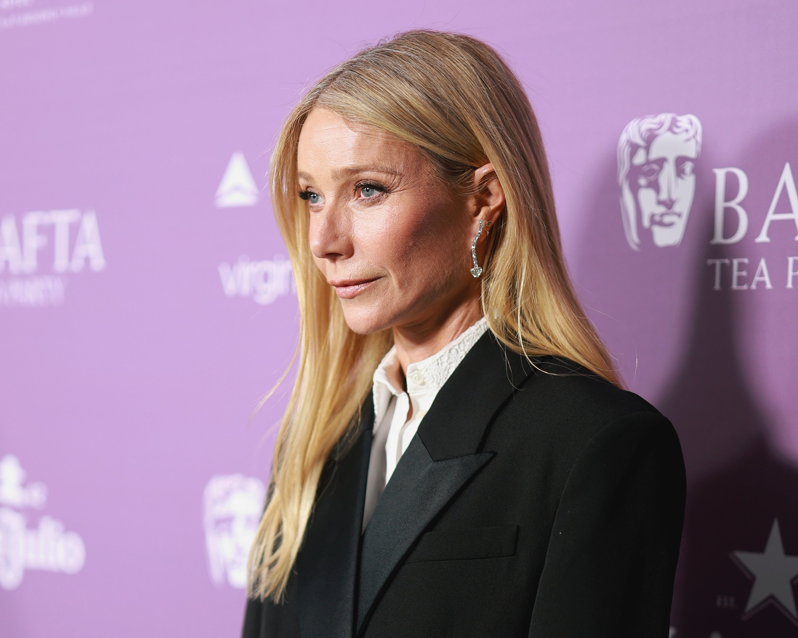 Gwyneth Paltrow in a formal blazer and shirt attends a BAFTA event