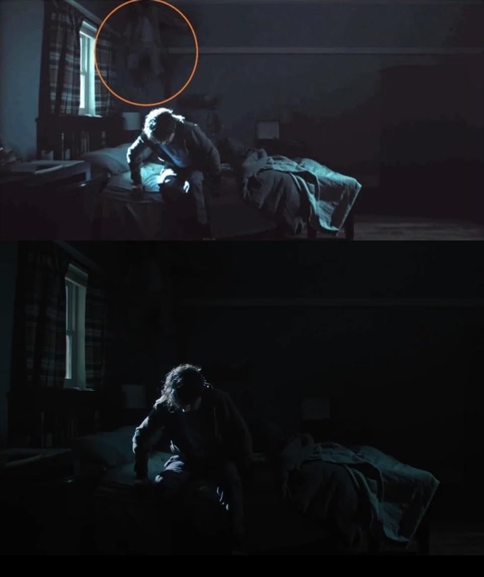A person sits on a bed in a dimly lit room, with a figure circled in the background, suggesting a mysterious or unsettling presence