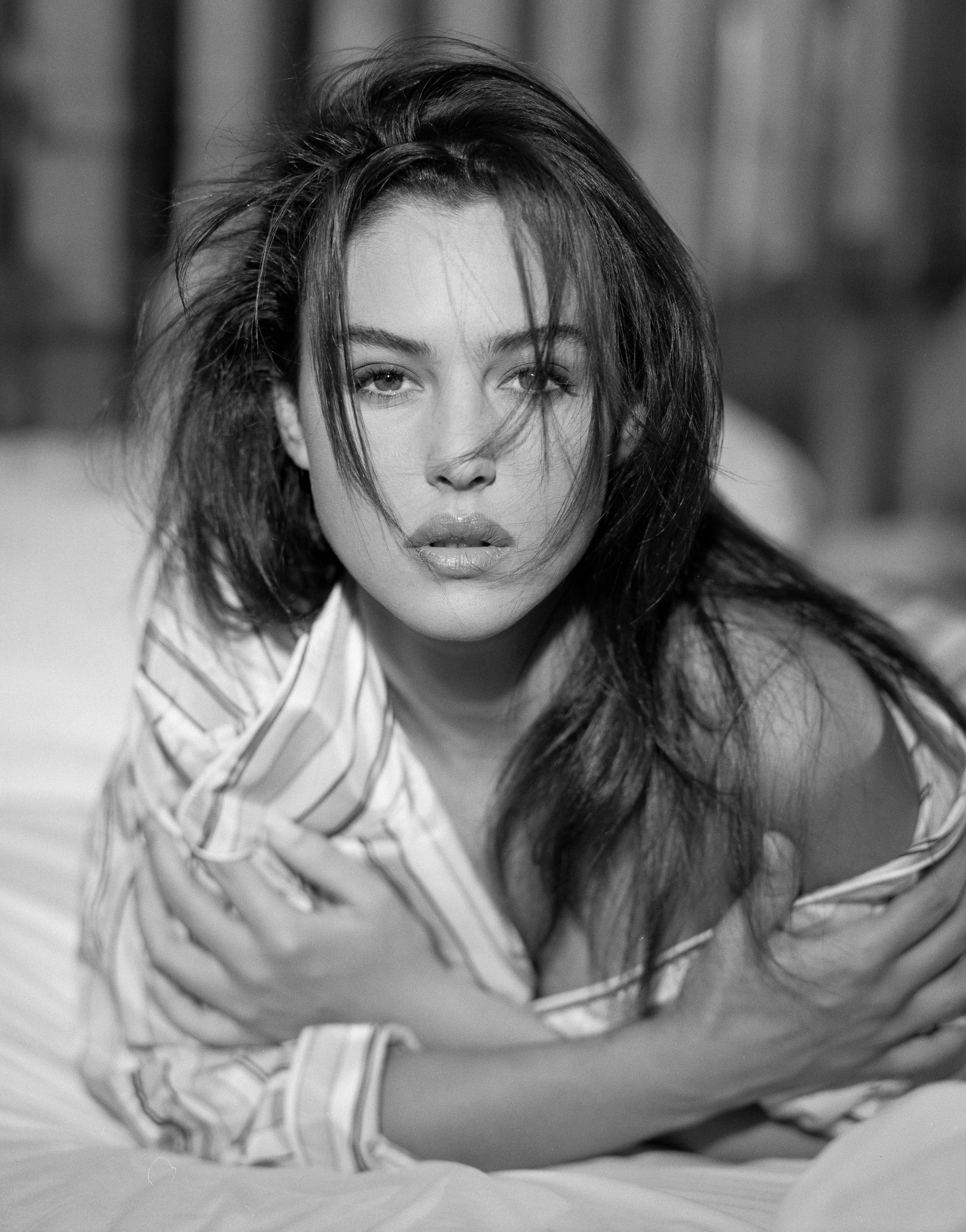 A black-and-white portrait of Monica Bellucci