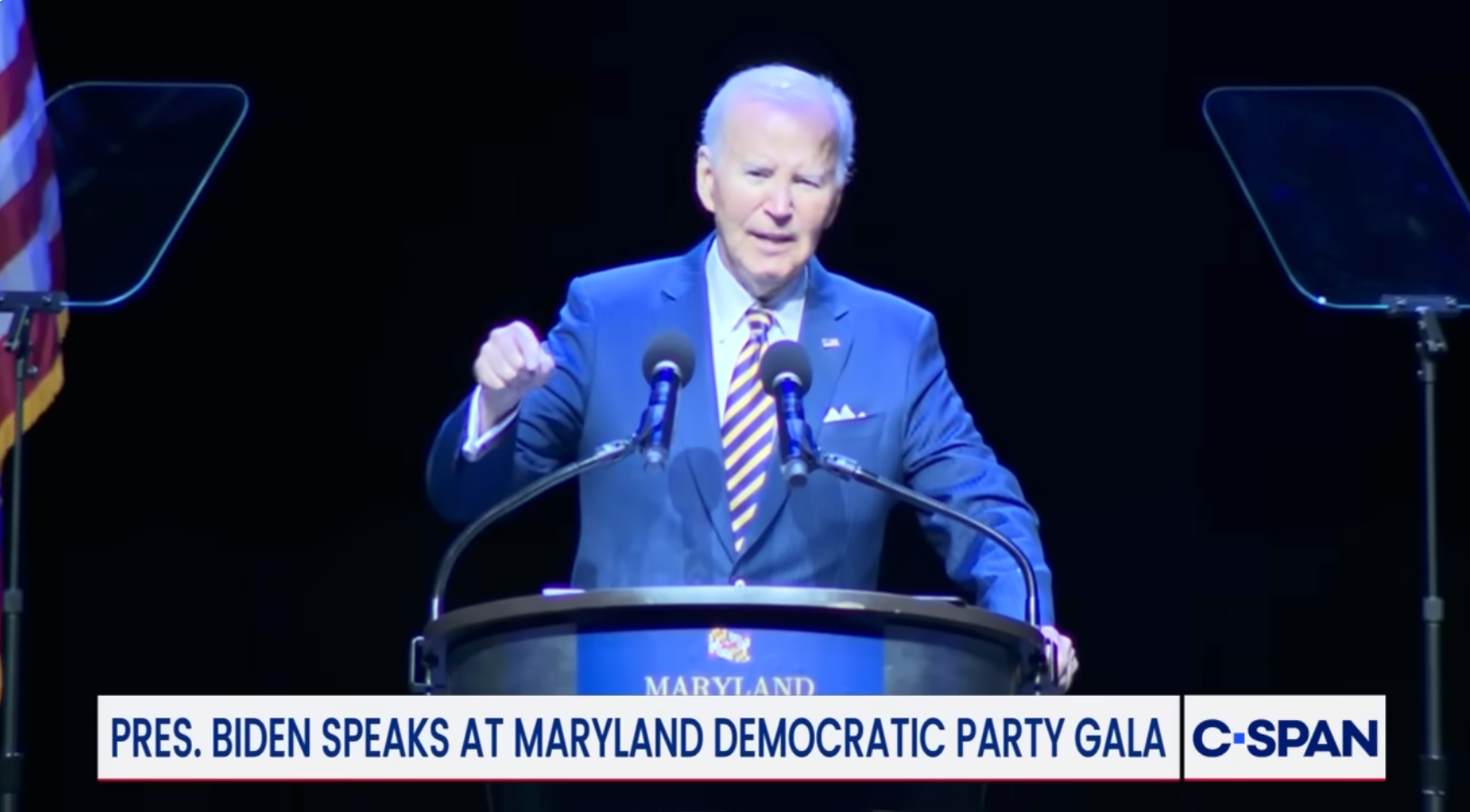A idiosyncratic speaks astatine a podium with microphones astatine the Maryland Democratic Party Gala. Text overlay indicates the lawsuit is covered by C-SPAN