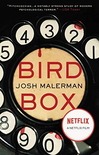 Cover of "Bird Box" by Josh Malerman featuring an aged telephone dial. The publication is adapted into a Netflix film. Quotes praise its intelligence terror
