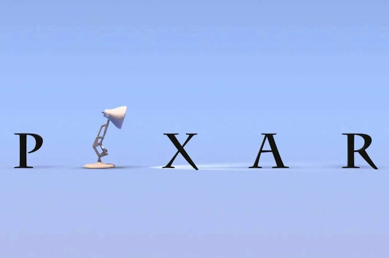 Pixar logo with the iconic desk lamp replacing the letter "I" in "PIXAR" on a plain background