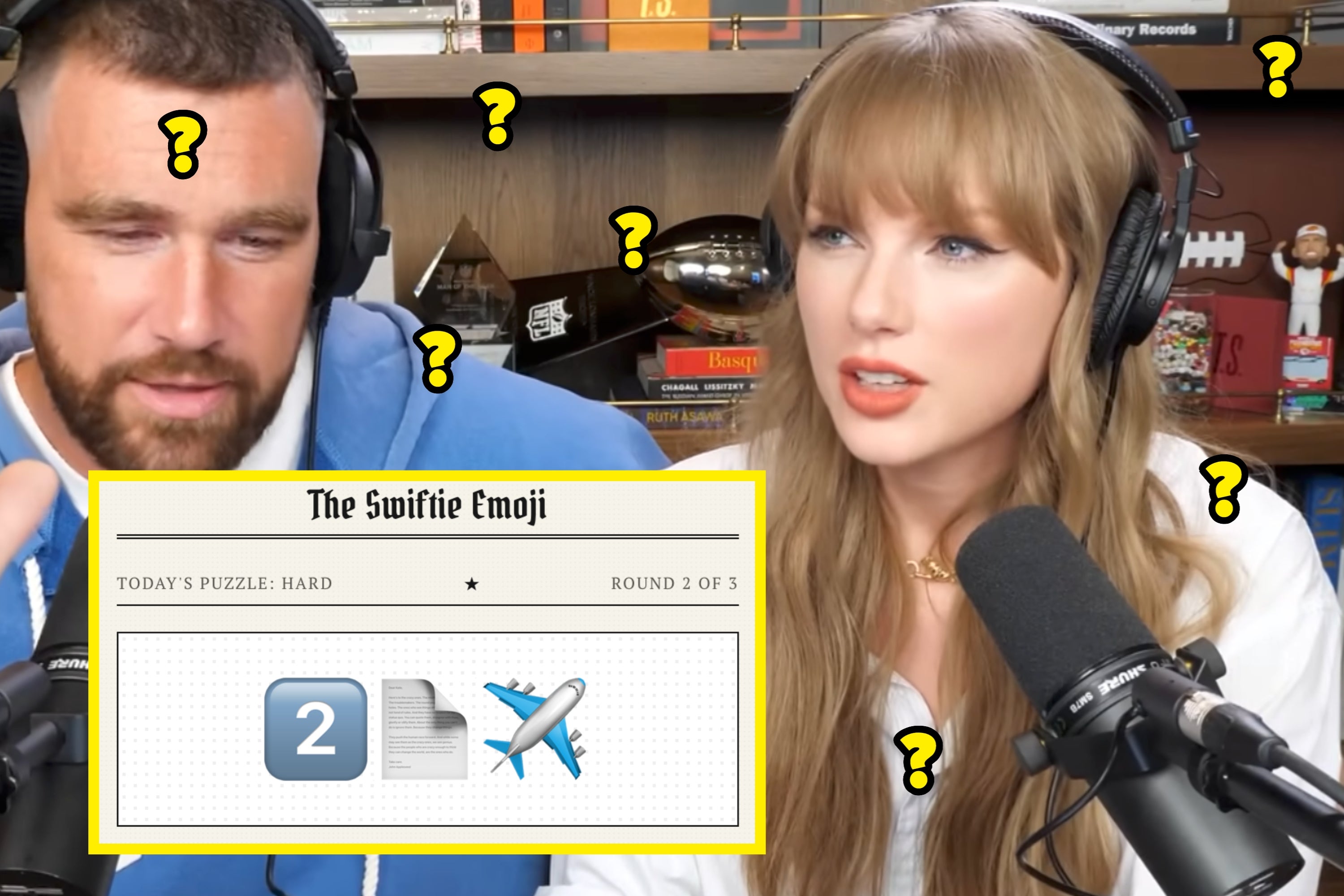Two people with headphones speak into microphones in a casual setting, with books and toys in the background