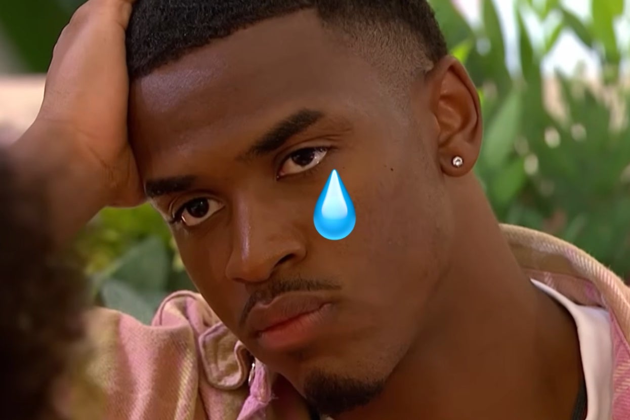 Person with a serious expression, resting their head on their hand, with a digitally added teardrop emoji on their cheek