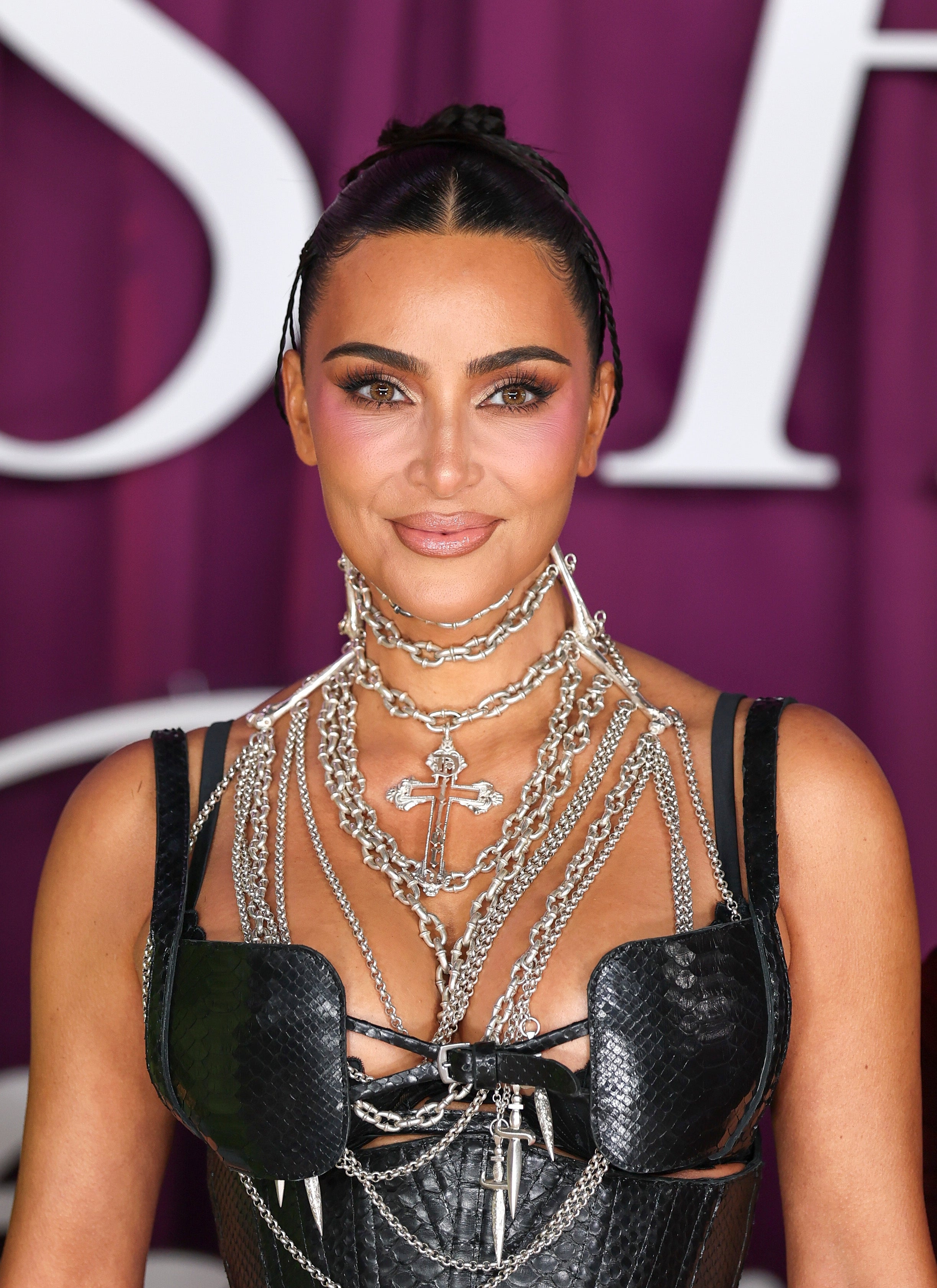 Kim connected  a reddish  carpet