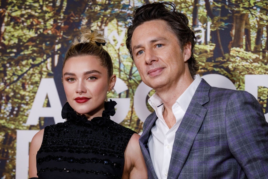 Florence Pugh and Zach Braff pose together at an event