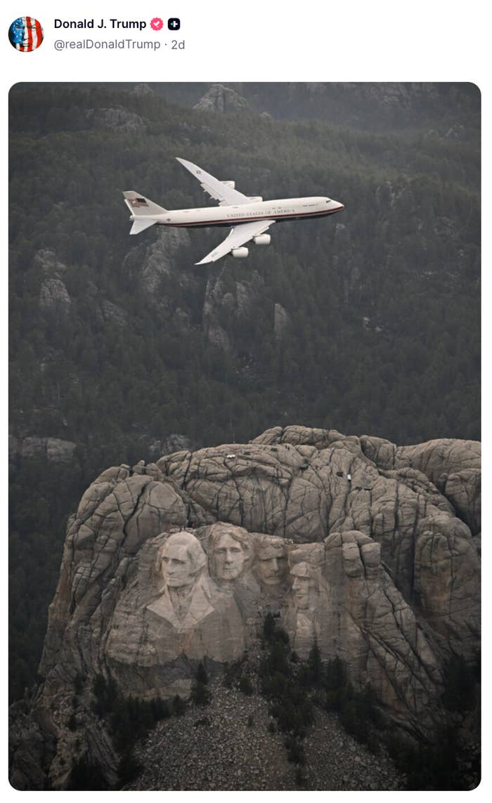 Plane flying implicit    Mount Rushmore, showing the statesmanlike  sculptures carved into the mountain