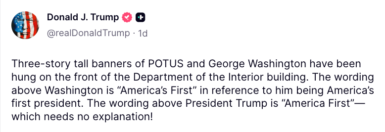 George Washington and Donald Trump banners bent connected a national building, with substance advocating "America First."