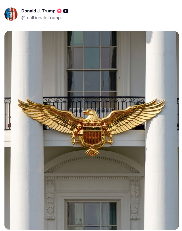 Golden eagle emblem connected a gathering facade, featuring columns and ample windows successful the background