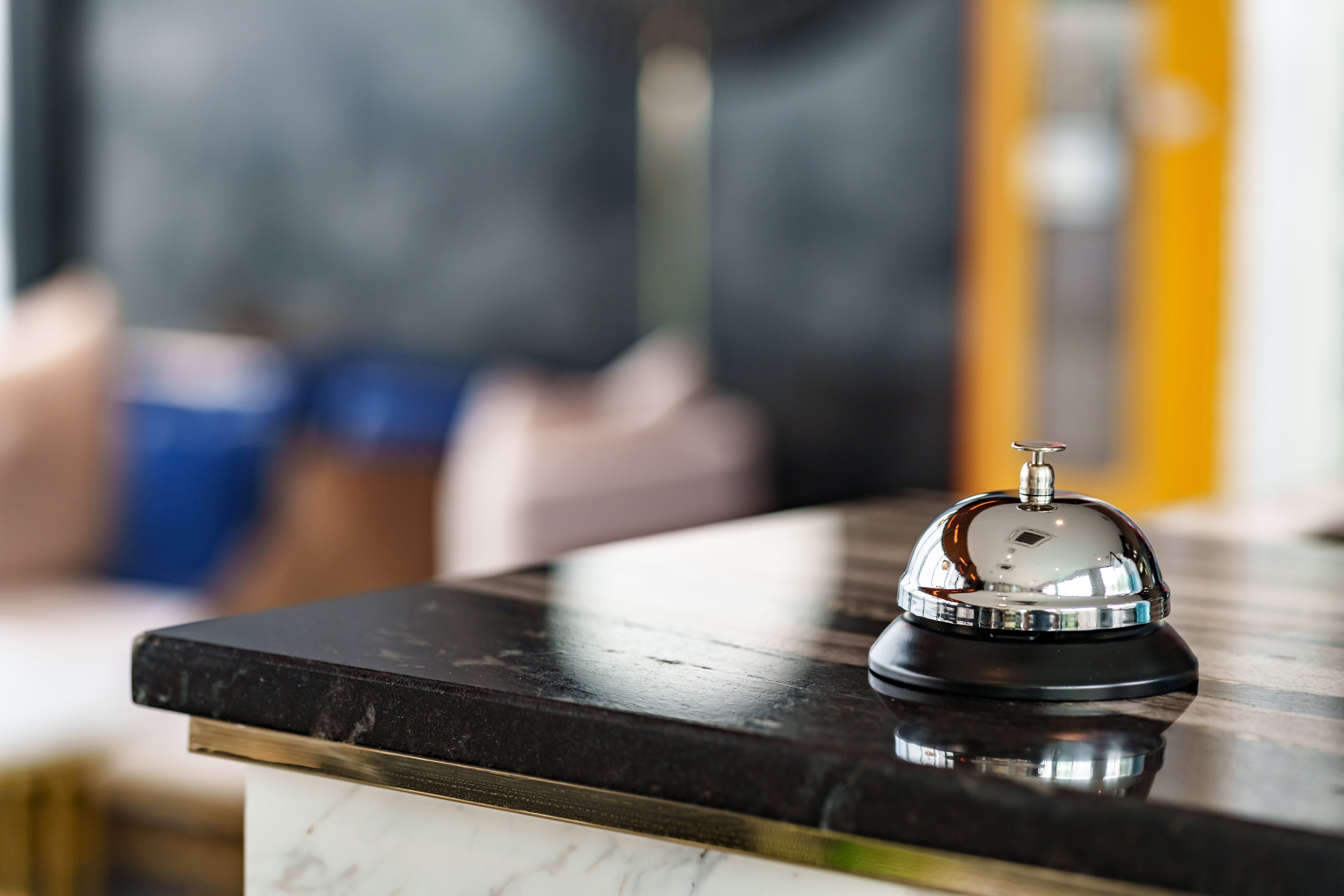 A edifice  reception table  with a shiny work  bell